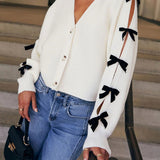 Bow V-Neck Cutout Sleeve Cardigan