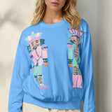 Double Take Full Size Sequin Nutcracker Long Sleeve Sweater