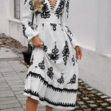 Ruffled Printed Plunge Long Sleeve Dress