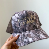 BIRDIE | Somebody's Problem Camo Trucker Hat - Final Sale