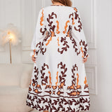 Plus Size Printed Surplice Flounce Sleeve Dress