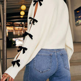 Bow V-Neck Cutout Sleeve Cardigan